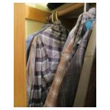 Closet contents. Mens button up shirts, dress pants, hats, blankets and more