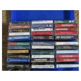 Portable CD and cassette players along with a case of Christmas cassette tapes