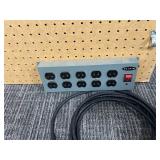 Peg Board with Belkin Power Strip Attached