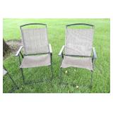 A Set Of Four Tan Lawn Chairs