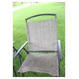 A Set Of Four Tan Lawn Chairs