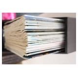 9 Magazine Holders That Are Styled Like Encyclopedias