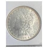 1886 US MORGAN SILVER DOLLAR SLABBED