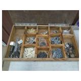 Organizer of door/window hardware. As shown.