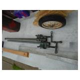 T-sqaures, gas cans, pipe vise & clamps. As shown.
