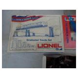 Assortment of model train accessories. As shown.