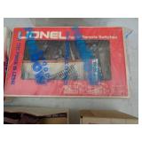 Assortment of model train accessories. As shown.