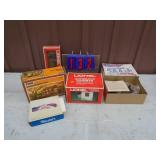 Assortment of model train accessories. As shown.