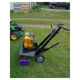Montgomery Wards front tine tiller. Briggs motor. Tested & works. As shown.