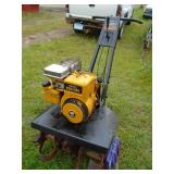 Montgomery Wards front tine tiller. Briggs motor. Tested & works. As shown.