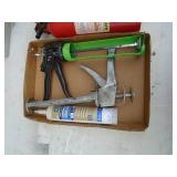 Misc flat of fire extinguishers & caulk guns. As shown.