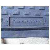 3 sets of floor mats. 1 weathertech. As shown.
