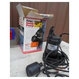 Sump pump. Looks nearly new & 4 wheel dolly. As shown,