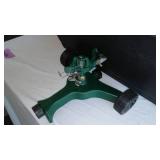 Planters, Sprinkler And Lopper.