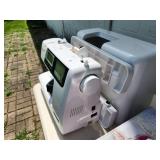 Janome Sewing Machine with Rolling Case
