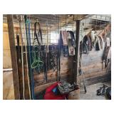 Equine Supplies - (6) Lead Ropes, (1) Bridle, Assorted Bits, (5) Halters, (9) Cinchers, (3) Buggy Whips, Leg Wraps, Saddle Bag, Box of Brushes and Hoof Tools