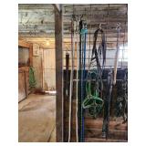 Equine Supplies - (6) Lead Ropes, (1) Bridle, Assorted Bits, (5) Halters, (9) Cinchers, (3) Buggy Whips, Leg Wraps, Saddle Bag, Box of Brushes and Hoof Tools