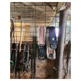 Equine Supplies - (6) Lead Ropes, (1) Bridle, Assorted Bits, (5) Halters, (9) Cinchers, (3) Buggy Whips, Leg Wraps, Saddle Bag, Box of Brushes and Hoof Tools