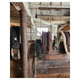 Equine Supplies - (6) Lead Ropes, (1) Bridle, Assorted Bits, (5) Halters, (9) Cinchers, (3) Buggy Whips, Leg Wraps, Saddle Bag, Box of Brushes and Hoof Tools