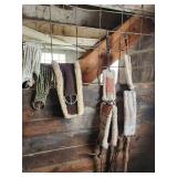 Equine Supplies - (6) Lead Ropes, (1) Bridle, Assorted Bits, (5) Halters, (9) Cinchers, (3) Buggy Whips, Leg Wraps, Saddle Bag, Box of Brushes and Hoof Tools