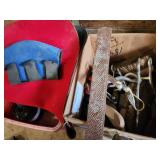 Equine Supplies - (6) Lead Ropes, (1) Bridle, Assorted Bits, (5) Halters, (9) Cinchers, (3) Buggy Whips, Leg Wraps, Saddle Bag, Box of Brushes and Hoof Tools