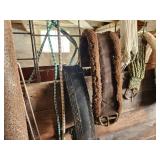 Equine Supplies - (6) Lead Ropes, (1) Bridle, Assorted Bits, (5) Halters, (9) Cinchers, (3) Buggy Whips, Leg Wraps, Saddle Bag, Box of Brushes and Hoof Tools