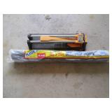 Plastic sheeting and a tile cutter...