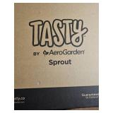 Lot of Tasty by AeroGarden Sprout, Music of the Spheres, Porcelain Plate, and Decorative Plant Pot