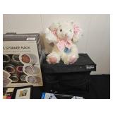 Assorted Household Items Including Bear Plush, Storage Rack, and More