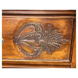 Antique Wooden Dresser with Intricate Carvings