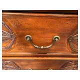 Antique Wooden Dresser with Intricate Carvings
