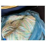 Lot of Craft Supplies Including Yarn, Quilting Fabrics, and Portable Organizer