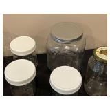 Collection of Assorted Glass Jars and Containers