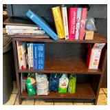 Wood Bookshelf with Cookbooks and Gardening Supplies