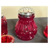 Lot of Red Glass Salt and Pepper Shakers and Accessories