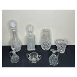 Collection of Crystal Glassware Including Decanters, Vases, and Pitchers