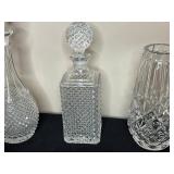 Collection of Crystal Glassware Including Decanters, Vases, and Pitchers
