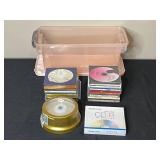 Lot of Memorex DVDs, CDs, and Plastic Storage Bin