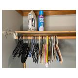 Closet Organization Lot with Shelves, Hangers, Iron, and Sizing Spray