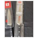 Lot of Various Kitchen Items Including Henckels Knives, Glassware, and Baking Trays