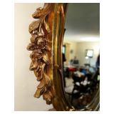 Ornate Gold Framed Mirror Measuring 18 Inches by 29 Inches.
