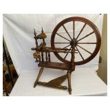 Antique Spinning Wheel 35 Inches by 32 Inches by 22 Inches.