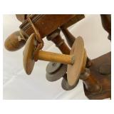 Antique Spinning Wheel 35 Inches by 32 Inches by 22 Inches.