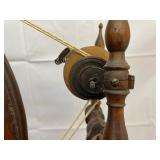 Antique Spinning Wheel 35 Inches by 32 Inches by 22 Inches.
