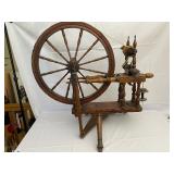 Antique Spinning Wheel 35 Inches by 32 Inches by 22 Inches.