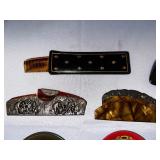Antique Combs, Hairbrushes, and Coca-Cola Decorative Platters.