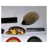 Antique Combs, Hairbrushes, and Coca-Cola Decorative Platters.