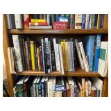 Middle Shelf of Books as Seen in Photo.