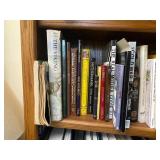 Middle Shelf of Books as Seen in Photo.