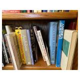 Middle Shelf of Books as Seen in Photo.